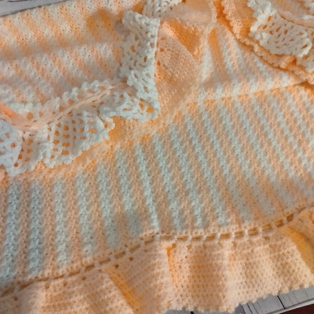 Never used.  ( my mom) homemade baby 🐥 blanket